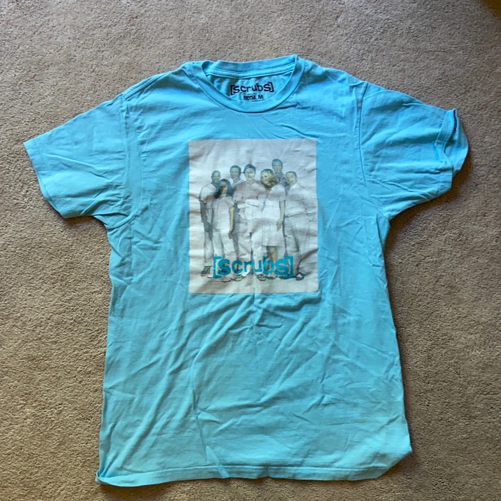 Scrubs show light blue t shirt
